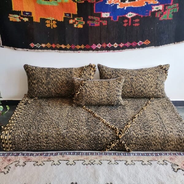 Main image of Moroccan floor sofa in black and mustard mix – handcrafted low seating with minimalist cushions for stylish and bold spaces
