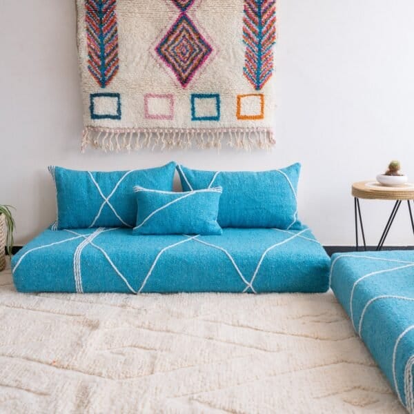 Artisan turquoise Moroccan floor sofa with matching plain cushions – perfect for coastal, boho, or modern living spaces