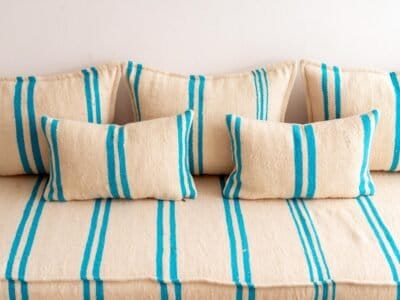 Cushions from Moroccan wool sofa in cream with turquoise – handwoven pillows for cozy, modern bohemian decor