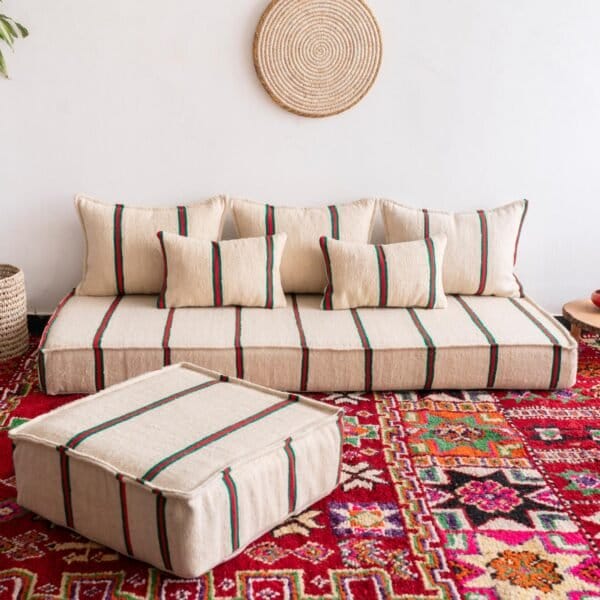 Main image of Moroccan wool floor couch in cream with red and green stripes – low handcrafted seating with cushions for festive boho vibes