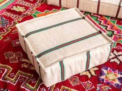 Handcrafted cushions from Moroccan wool sofa in red and green stripes – cozy pillows for bohemian home decor