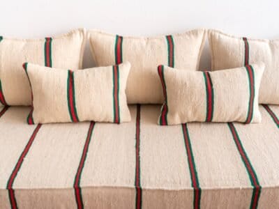 Handcrafted cushions from Moroccan wool sofa in red and green stripes – cozy pillows for bohemian home decor