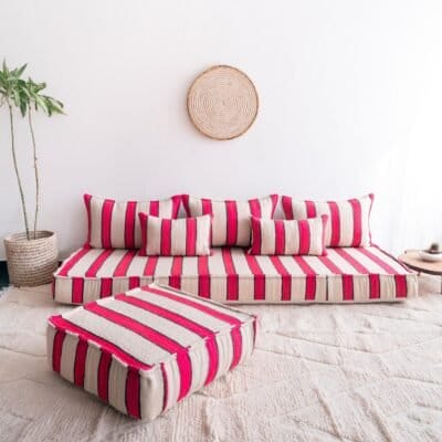 handmade Moroccan wool sofa in cream with bold red and black stripes – low floor seating set for boho and modern homes