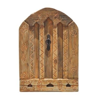 Handcrafted Amazigh cedar wood panel with traditional Berber carvings and distressed vintage finish