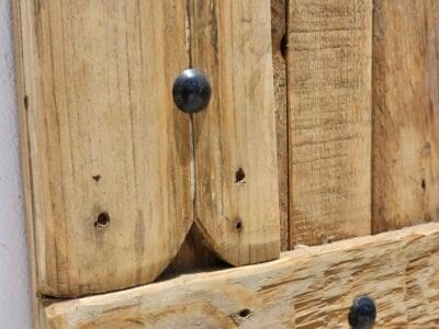 Close-up of natural wood textures and hand-carved grooves in Moroccan