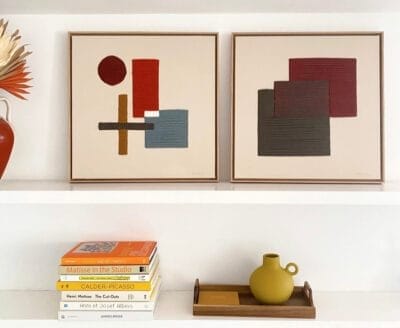 Framed Kanica wool wall art hanging on a neutral wall, adding warmth and texture to a modern boho living room
