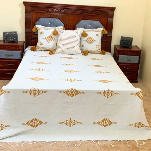 white Moroccan handwoven wool blanket with mustard yellow embroidery – includes 3 coordinating pillows