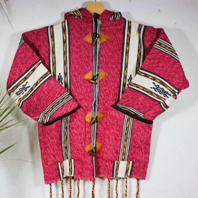 Handmade Moroccan fleece hoodie in pink and white stripes, unisex boho jacket with soft fleece and natural wool, wooden toggle buttons, cozy hood, artisan crafted for casual wear, travel, festivals, and layering. Popular in USA, UK, and European bohemian fashion markets.