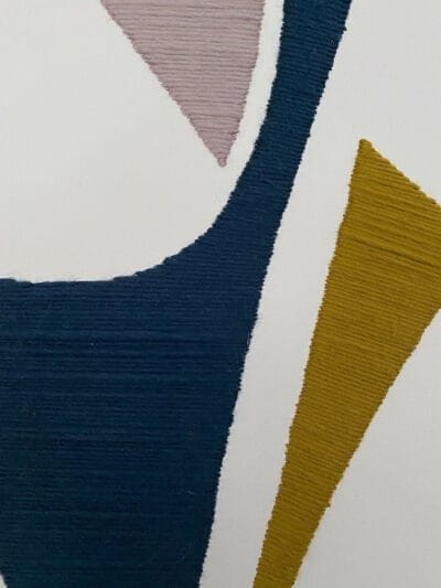 Unique wool on canvas artwork with Berber-inspired abstract design. Framed in light wood, 65 x 50 cm. Handcrafted, original, and ready to hang.