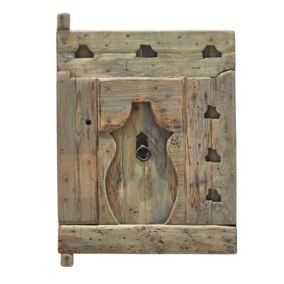 Handcrafted Amazigh cedar wood panel featuring traditional Berber carvings with rustic vintage finish