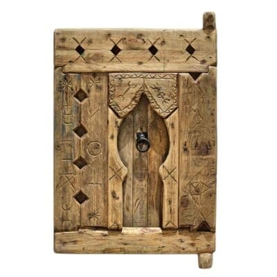 Handcrafted Amazigh cedar wood panel with authentic Berber carvings and rustic vintage finish