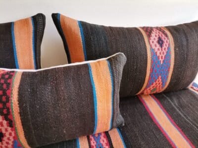 Interior detail showing quality stitching and hidden zipper on wool cushion