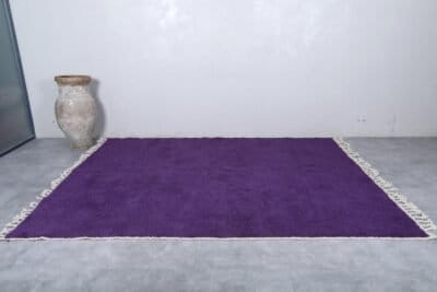 Moroccan royal purple Beni Ourain wool rug with soft texture.