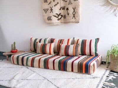 ivory lamb wool Moroccan floor cushion with colorful stripes