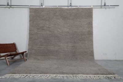 Handmade Moroccan taupe wool rug with Beni Ourain design and soft texture.