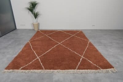 terracotta and ivory Beni Ourain Moroccan rug in custom size, highlighting the soft wool pile and detailed geometric design.