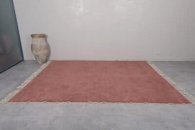 handmade Moroccan rust brown wool rug showcasing thick, soft fibers and traditional Berber craftsmanship, ideal for cozy living rooms or bedrooms with natural decor.