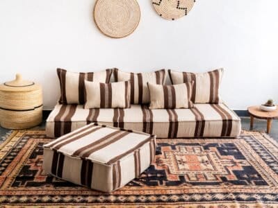 Handmade Moroccan floor couch covers in ivory with brown Berber stripes, unstuffed wool cushions with zippered openings